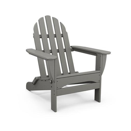 Gray POLYWOOD Classic Folding Adirondack Chair with slatted back and wide armrests, crafted from recycled plastic.