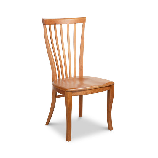 An American-made Classic Shaker Chair #1 with Scooped Wooden Chair - Floor Model, crafted in natural cherry, isolated on a white background by Lyndon Furniture.