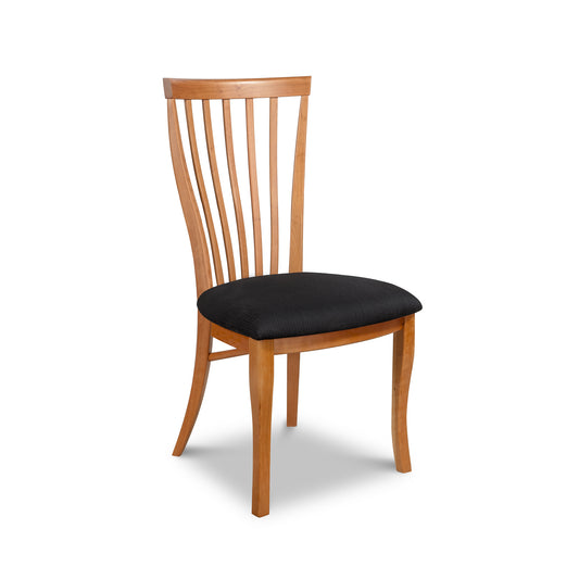 A Classic Shaker Chair #1 made by Lyndon Furniture, crafted from natural hardwoods with a black seat.