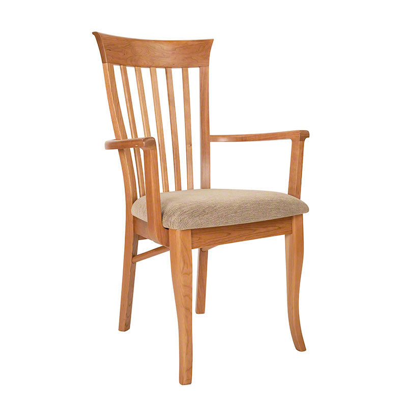 A wooden dining chair with a beige upholstered seat.