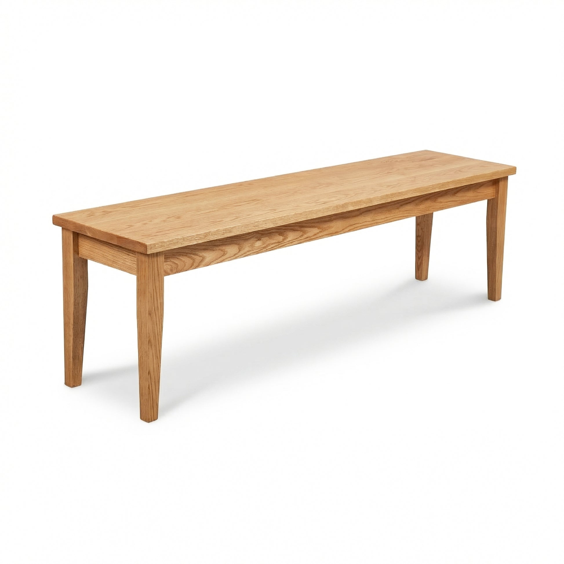 Lyndon Furniture Classic Shaker Bench crafted from solid wood with four sturdy legs and a flat seat, highlighting timeless American craftsmanship.