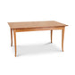 Lyndon Furniture Classic Shaker Flare Leg Extension Dining Table with rectangular wood top and four elegant, curved shaker-style legs.
