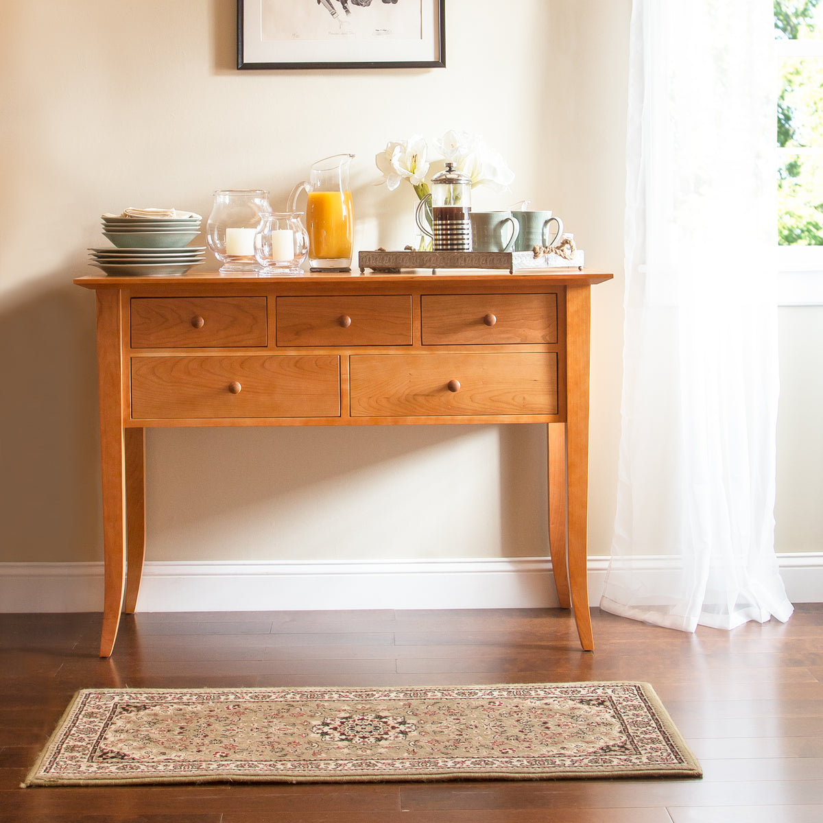 Lyndon Furniture Classic Shaker Flare Leg 48″ Hunt Board, handcrafted in Vermont, beautifully showcases quality craftsmanship and elegant design.