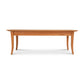 A wooden Lyndon Furniture Classic Shaker Flare Leg Coffee Table that combines functionality and style.