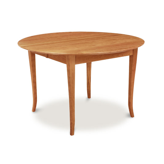 Handmade in Vermont, the Lyndon Furniture Classic Shaker Flare Leg Round Extension Table features a wooden top and elegantly flared legs. This sustainable furniture piece is perfect for gathering around with friends and family.