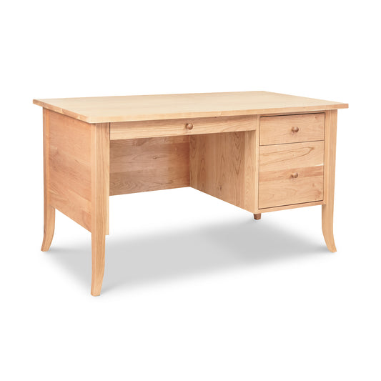 The Small Wood Flare Leg Executive Desk by Lyndon Furniture boasts a flat rectangular top and features a wide central drawer with a knob, accompanied by two aligned drawers on the right side. Reminiscent of a Classic Shaker Dining Table, this light maple desk showcases slightly curved legs and a smooth finish, embodying timeless craftsmanship. Ready to ship!