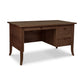 An image of a Small Wood Flare Leg Executive Desk with drawers made of solid wood by Lyndon Furniture.