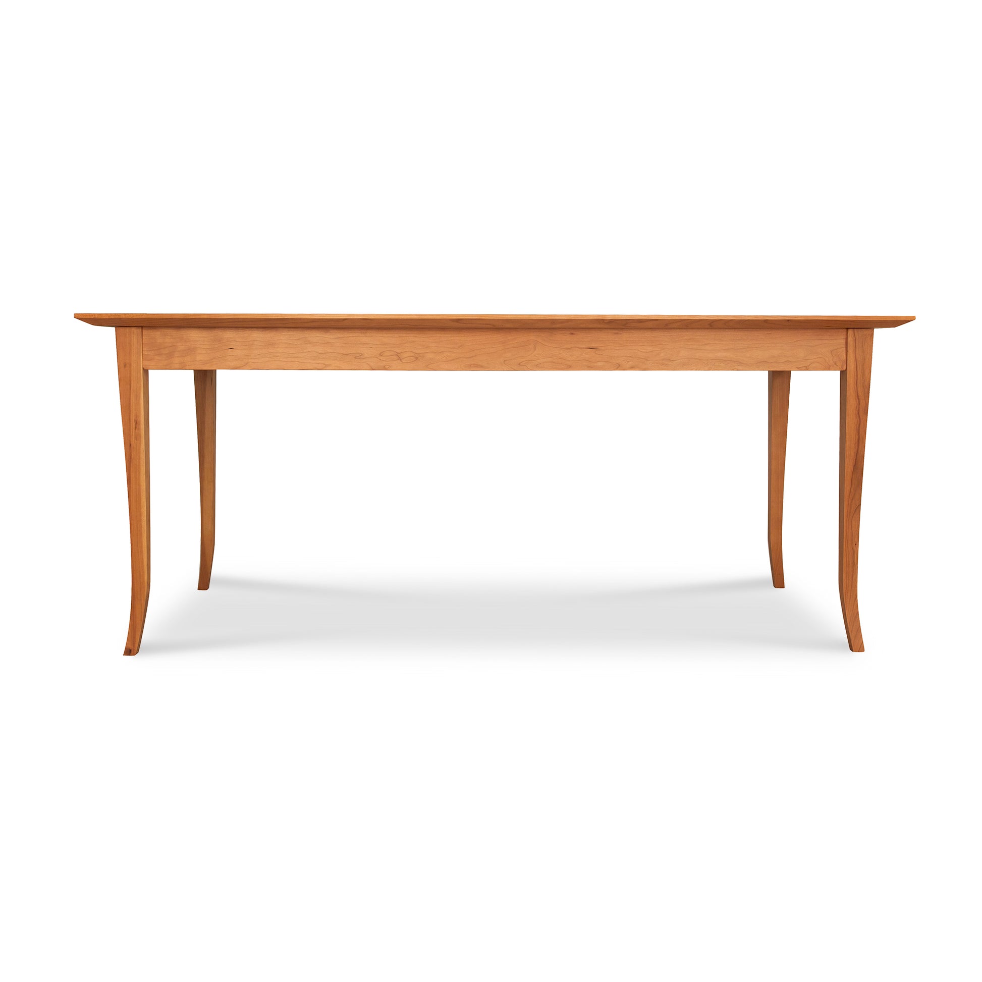 A Classic Shaker Flare Leg Solid Boat Top Table by Lyndon Furniture with a wooden top and flare legs.