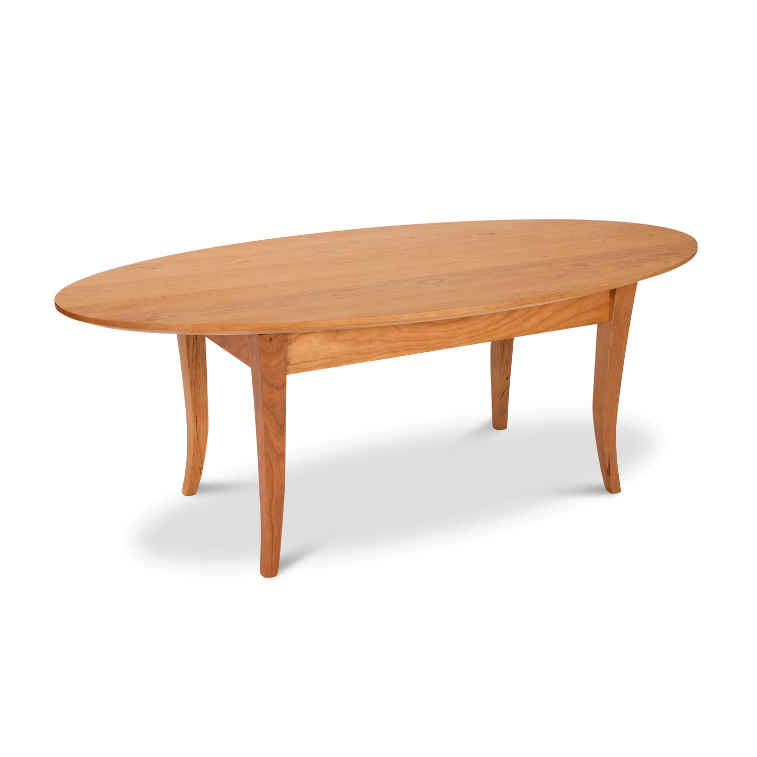 Lyndon Furniture Classic Shaker Flare Leg Oval Top Coffee Table crafted from solid hardwood, showcasing elegant curved legs and smooth oval surface.
