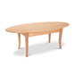 A Classic Shaker Flare Leg Oval Top Coffee Table with a solid wood top by Lyndon Furniture.