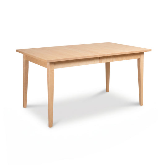 Lyndon Furniture Classic Shaker Extension Dining Table featuring a smooth tabletop and elegant tapered wooden legs.