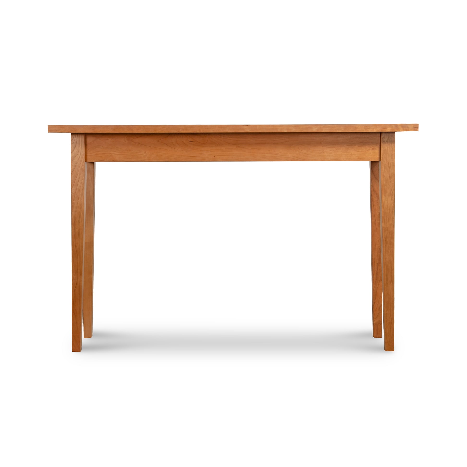 Alt text: The Classic Shaker Sofa Table by Lyndon Furniture in natural cherry wood finish, featuring a rectangular top with four straight, slightly tapered legs. American-made solid wood table in front view against a white background.