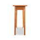 Lyndon Furniture Classic Shaker Sofa Table in natural cherry with tapered legs, viewed from the narrow side.