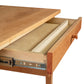 Lyndon Furniture Small Wood Executive Desk in Shaker style, showing open drawer with sliding tray and metal slides, crafted from solid wood.