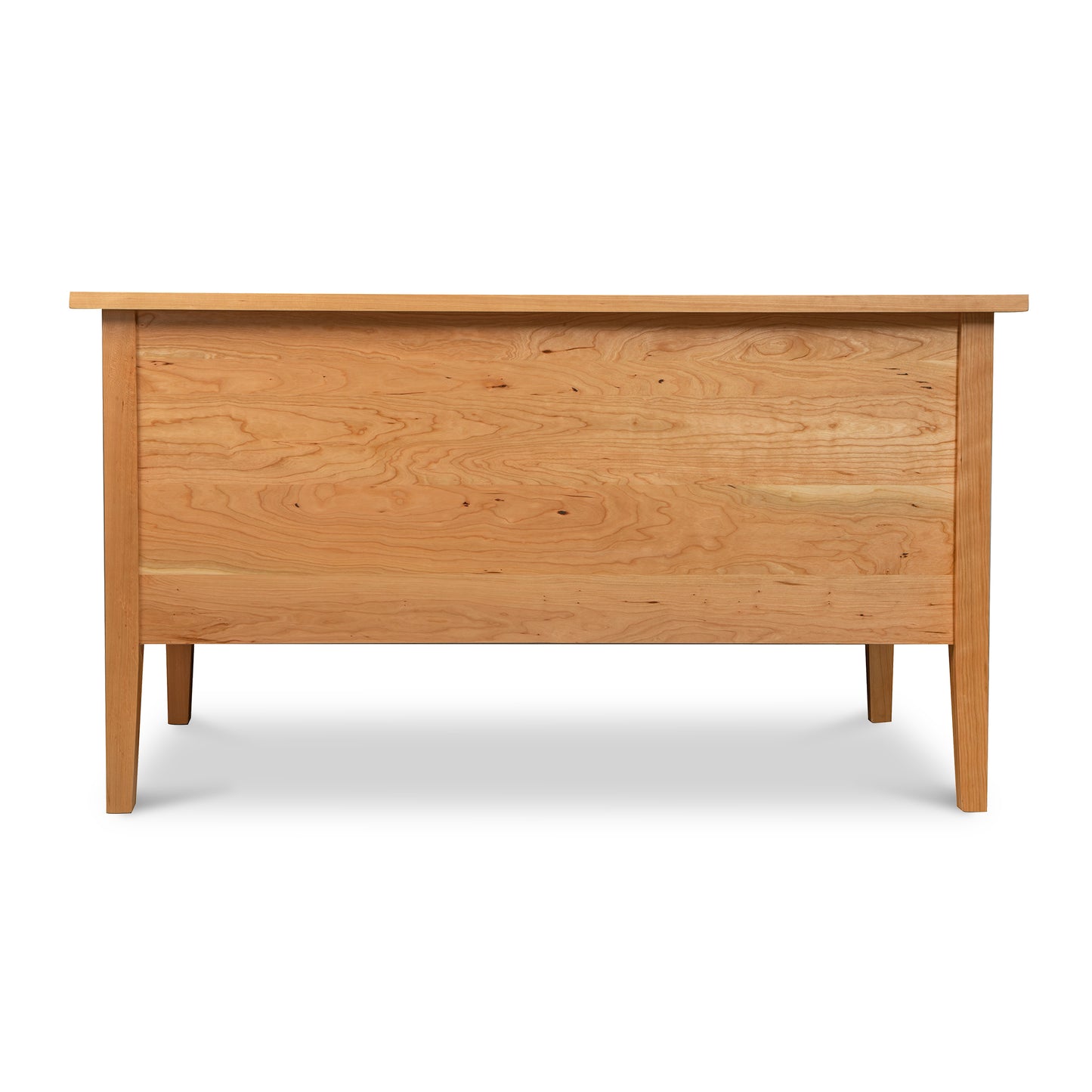 A Small Wood Executive Desk with a solid wood top by Lyndon Furniture.