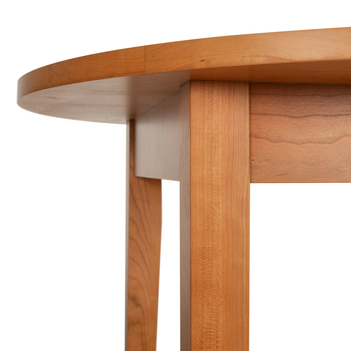 Classic Shaker Round Solid Top Dining Table featuring a smooth round tabletop edge and two straight solid hardwood legs.