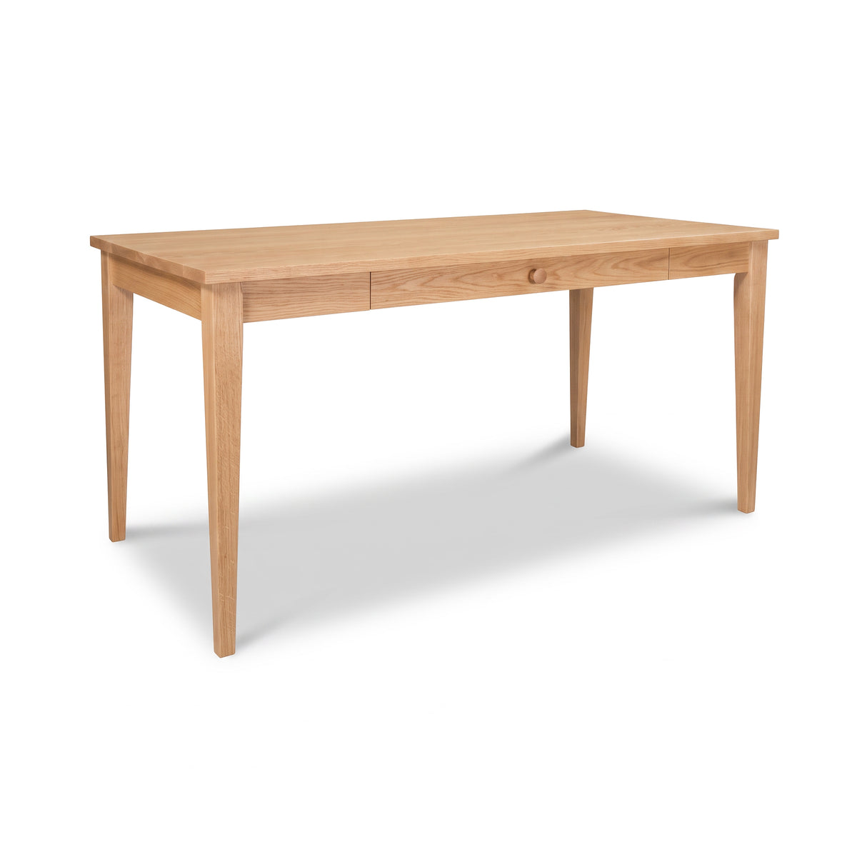 Classic Shaker writing desk handcrafted in light wood featuring elegant tapered legs and a single centered drawer.