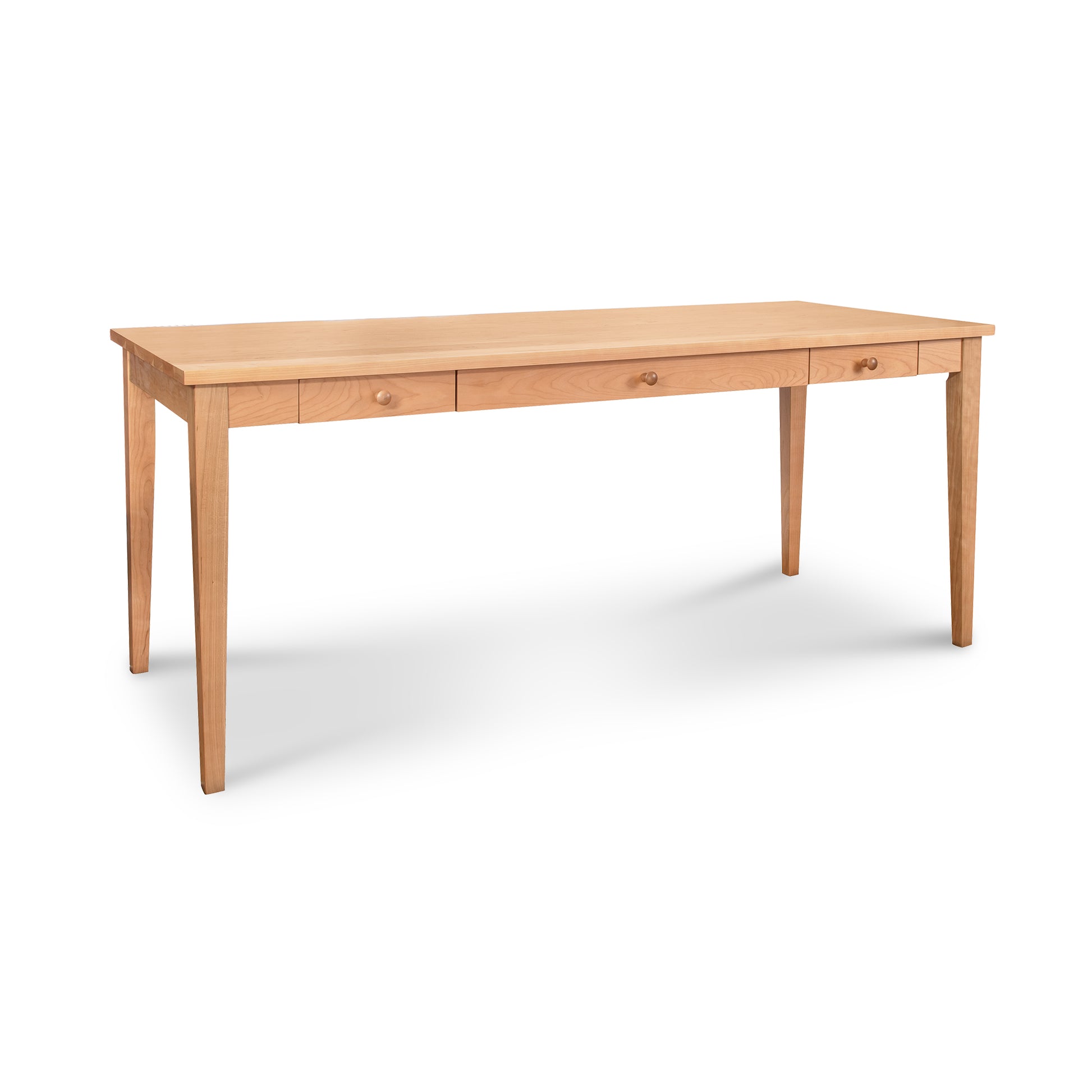 A Classic Shaker Writing Desk made by Lyndon Furniture, an eco-friendly desk made of solid wood with two drawers.
