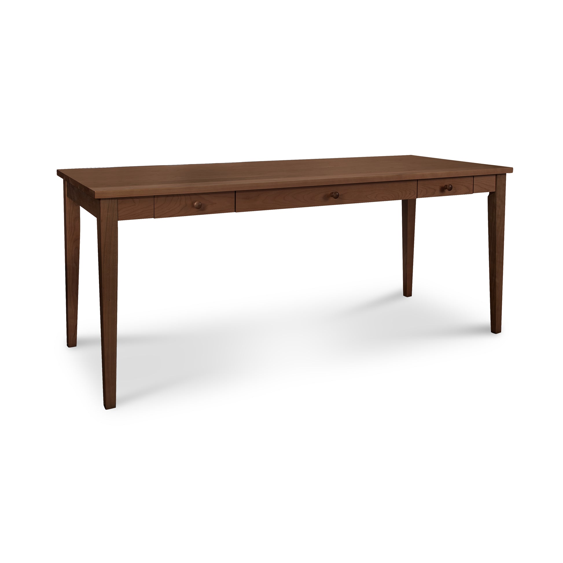 An eco-friendly Classic Shaker Writing Desk made of solid wood, featuring two drawers by Lyndon Furniture.
