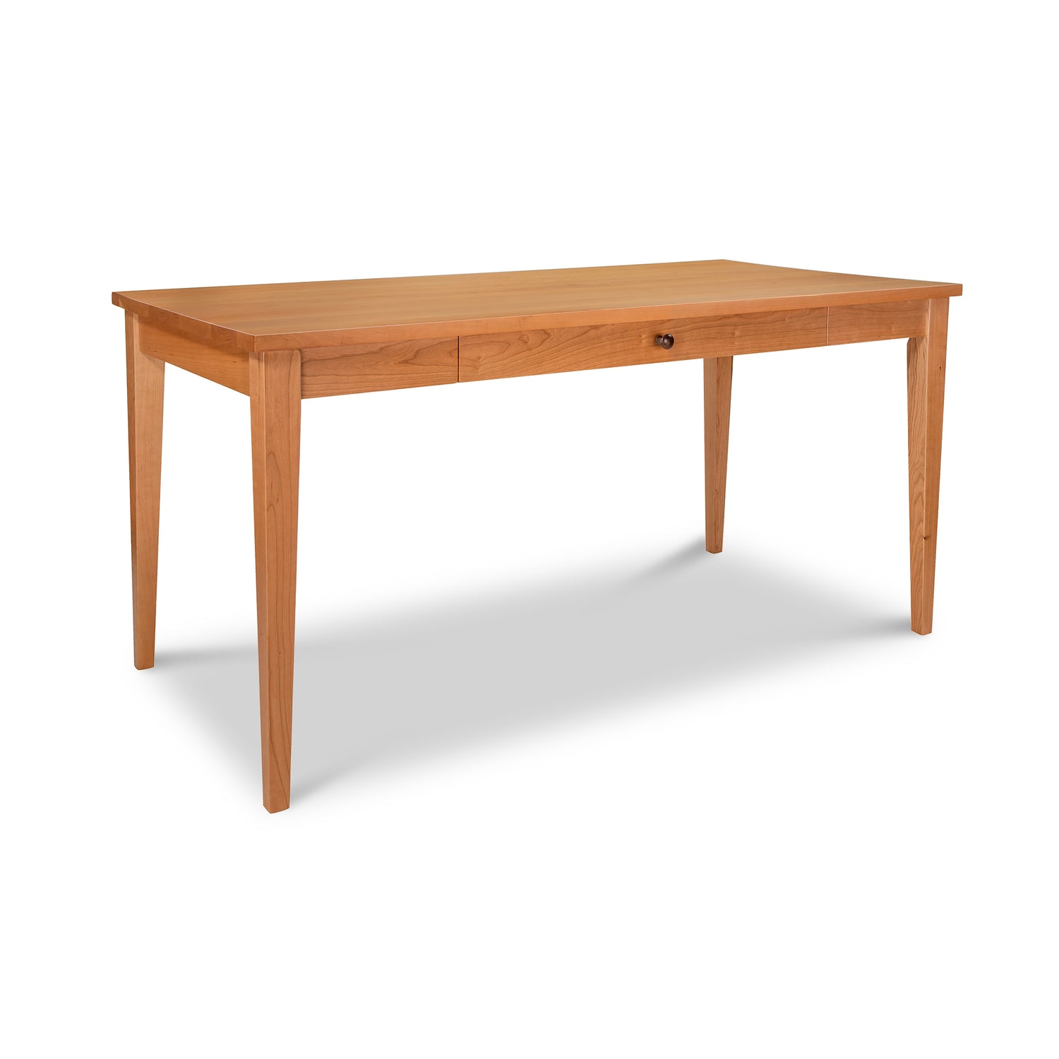 Classic Shaker writing desk by Lyndon Furniture in solid wood, featuring four tapered legs and a central drawer.