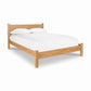 Lyndon Furniture Classic Wood Bed with headboard, crafted from solid wood, highlighting quality American craftsmanship and timeless design.