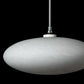 Round white Hubbardton Forge Clouds Low Voltage Mini Pendant suspended from a slim rod, showcasing elegant modern lighting design.