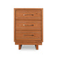 Vermont Furniture Designs Contemporary Cable 3-Drawer Nightstand in natural wood with silver handles, highlighting modern craftsmanship.