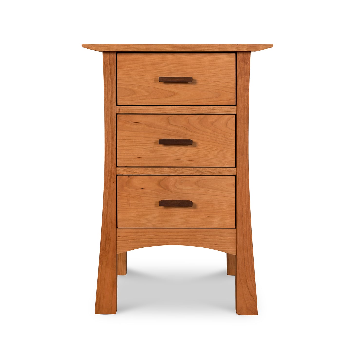 Contemporary Craftsman 3-Drawer Nightstand from Vermont Furniture Designs, with a slightly curved top and tapered legs against a white background, coated with an eco-friendly oil finish.