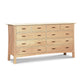 Handcrafted Vermont Furniture Designs Contemporary Craftsman dresser made of solid wood with 10 drawers and minimalist handles.