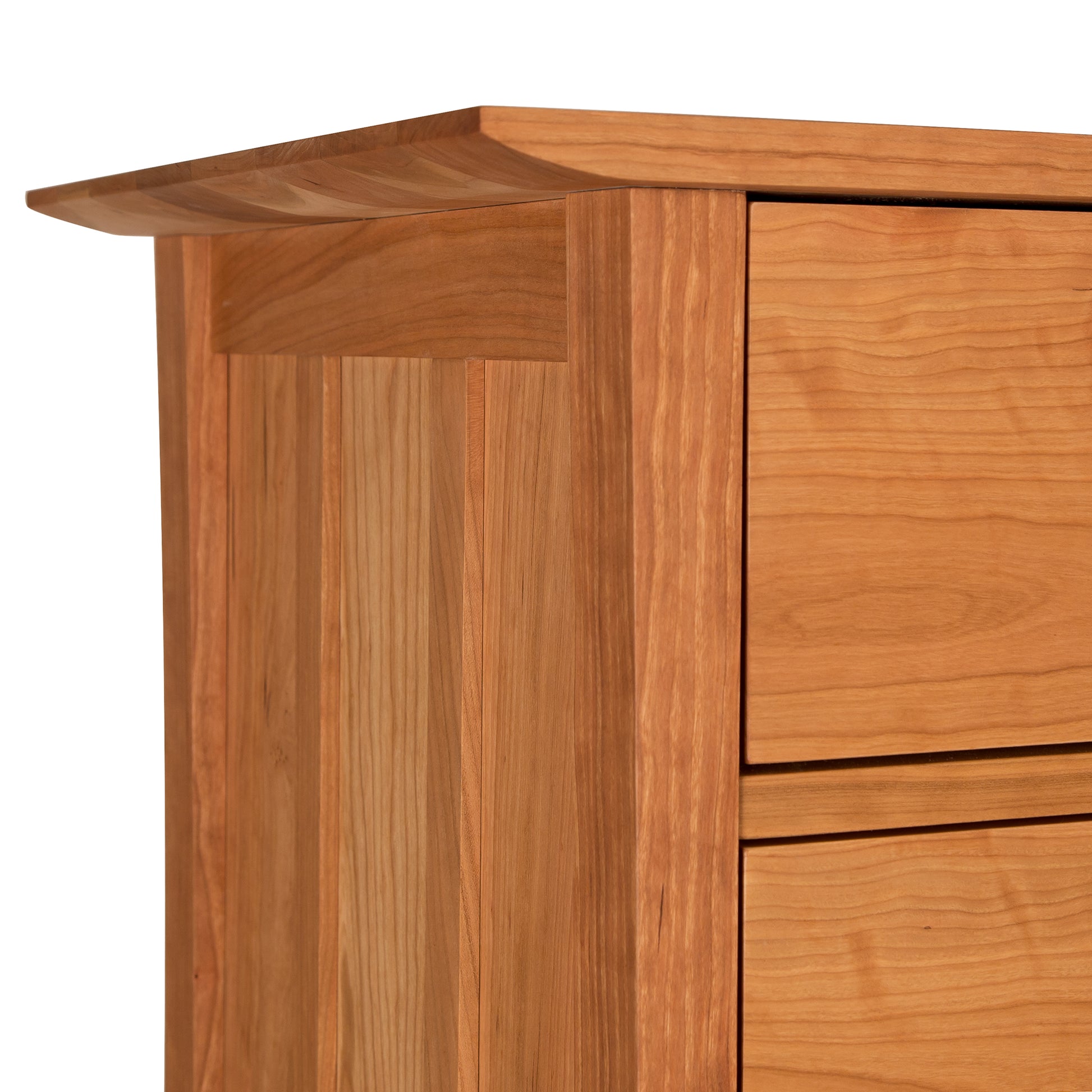 Close-up of Vermont Furniture Designs Contemporary Craftsman 4-Drawer Chest highlighting the grain pattern and smooth, eco-friendly oil finish of the solid hardwood.