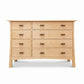 American made Contemporary Craftsman 8-drawer dresser in light wood with dark handles by Vermont Furniture Designs, quality hardwood furniture.