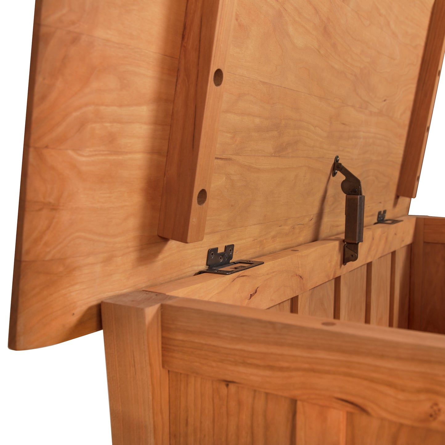 A close-up of a Vermont Furniture Designs Contemporary Craftsman Blanket Chest focusing on the joint and bracket hardware.