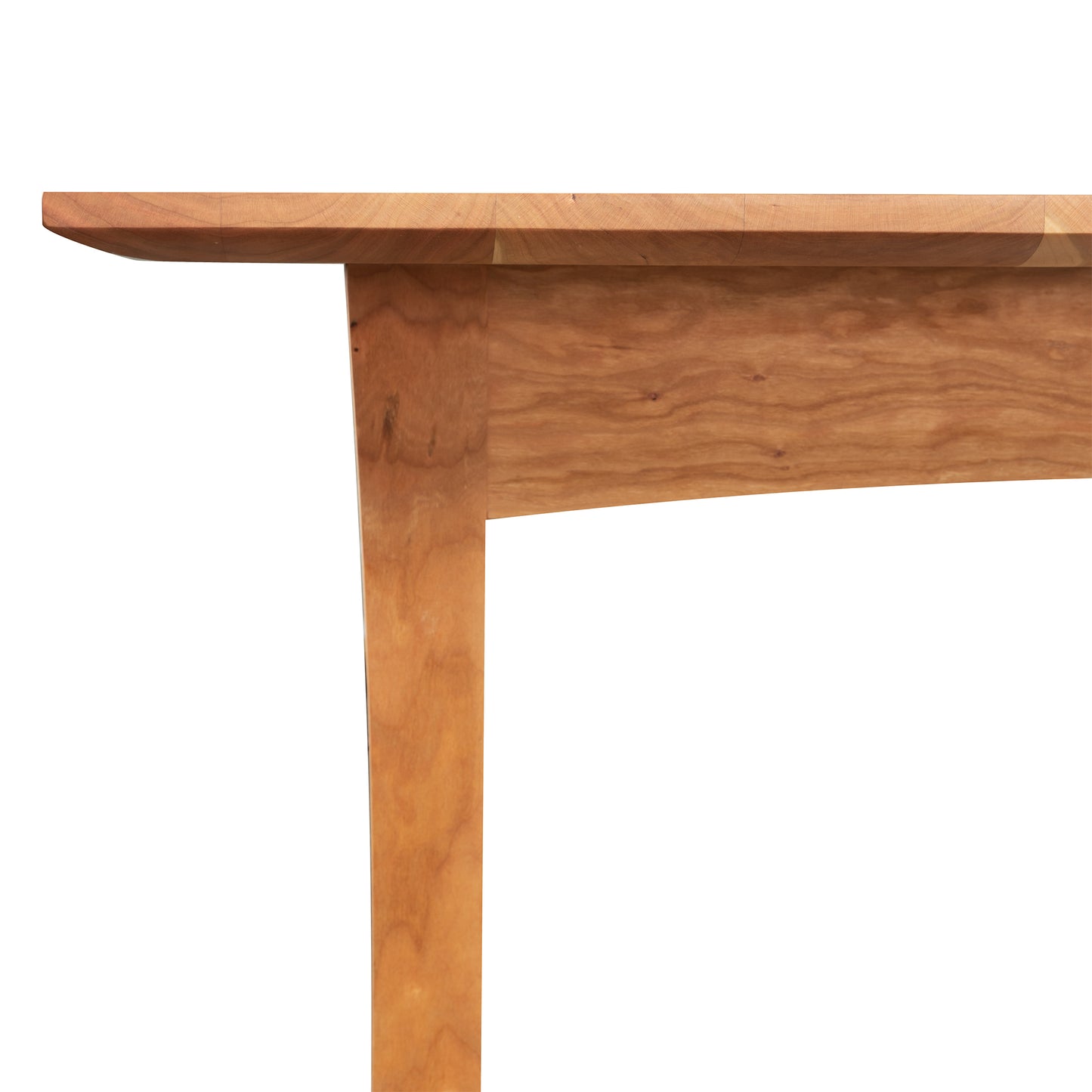 Close-up of a Vermont Furniture Designs Contemporary Craftsman Extension Dining Table corner against a white background, crafted by Vermont woodworkers.
