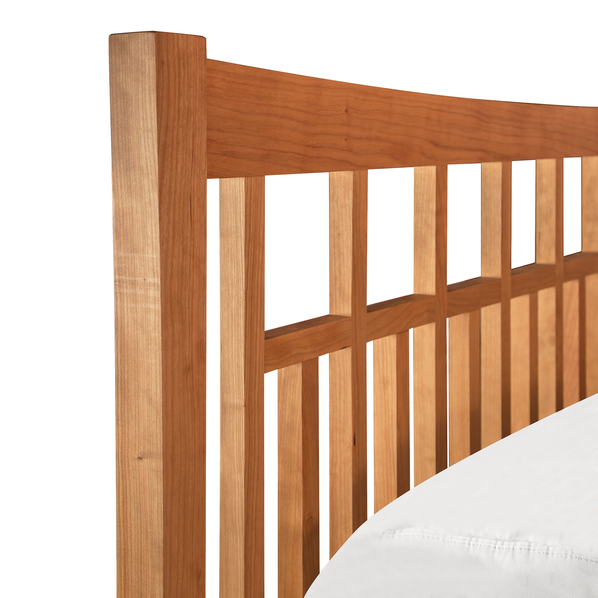 Contemporary Craftsman Low Footboard Platform Bed headboard with vertical slats on a white background has been replaced with:
Vermont Furniture Designs' Contemporary Craftsman Low Footboard Bed with vertical slats on a white background.