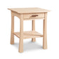 Contemporary Craftsman nightstand by Vermont Furniture Designs in light solid wood, single drawer, open shelf, curved legs, handcrafted in Vermont.