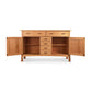 Contemporary Craftsman Sideboard by Vermont Furniture Designs with open doors, drawers, and shelves, showcasing fine American craftsmanship.