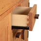 Close-up of dovetail drawer craftsmanship in the Vermont Furniture Designs Contemporary Craftsman Sideboard, American-made quality.