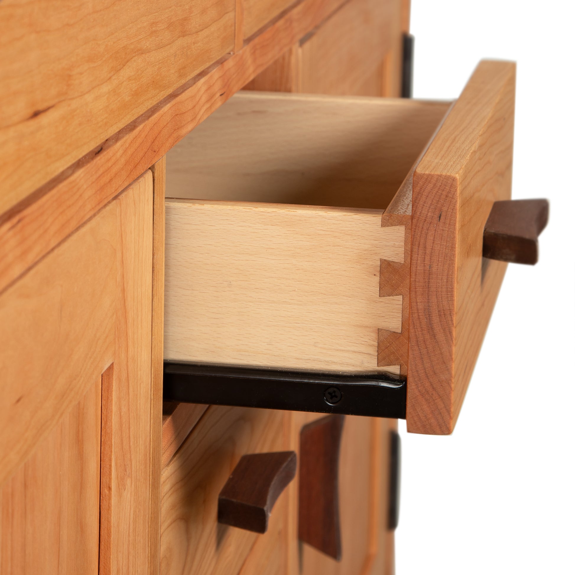 Close-up of dovetail drawer craftsmanship in the Vermont Furniture Designs Contemporary Craftsman Sideboard, American-made quality.