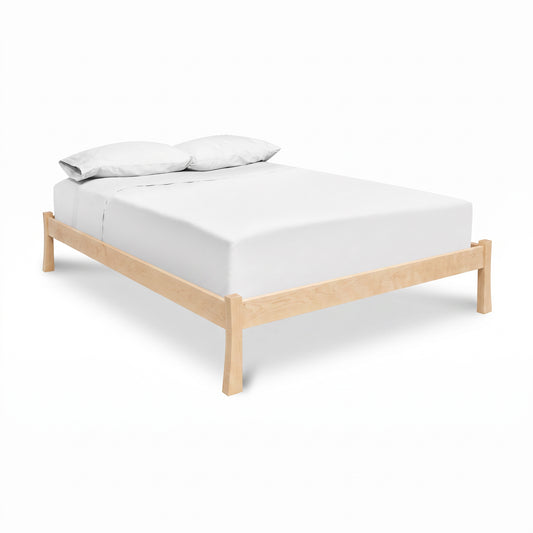 Contemporary Craftsman Studio-Style Platform Bed by Vermont Furniture Designs with mattress, sheet, and pillows. American made quality craftsmanship.