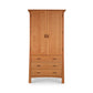 Sentence with product replaced: A Vermont Furniture Designs Contemporary Craftsman Tall Armoire with two doors above and three drawers below, against a white background.