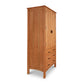 Vermont Furniture Designs Contemporary Craftsman Tall Armoire with a cabinet door on top and three drawers below, isolated on a white background.