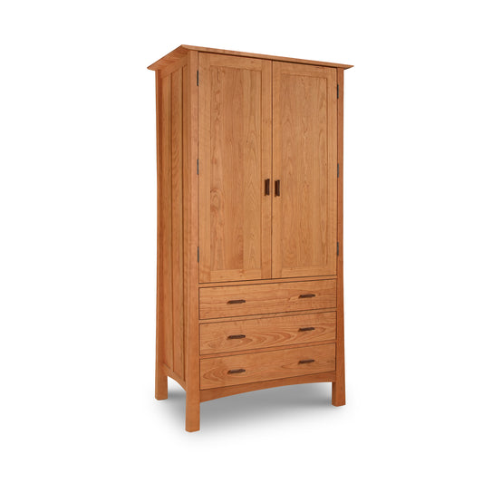Contemporary Craftsman Tall Armoire by Vermont Furniture Designs with two doors, three drawers, metal handles, and a natural wood finish. American made.