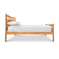A high-end Vermont Furniture Designs Contemporary Craftsman High Footboard Bed with white sheets.