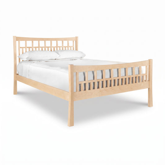 Contemporary Craftsman High Footboard Bed by Vermont Furniture Designs with vertical slats, white bedding, and two accent pillows.