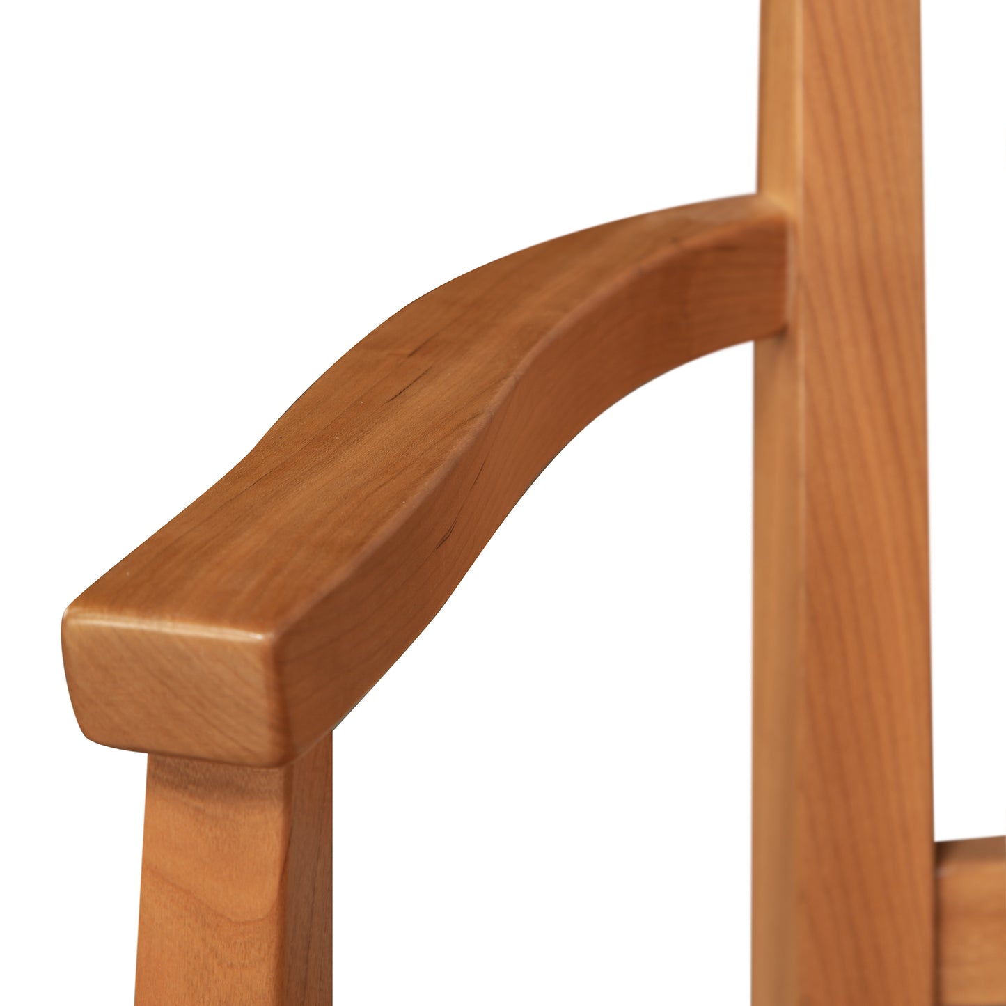 Close-up of the armrest and backrest of a Vermont Woods Studios Contemporary Shaker Chair, showing the smooth finish and natural wood grain.