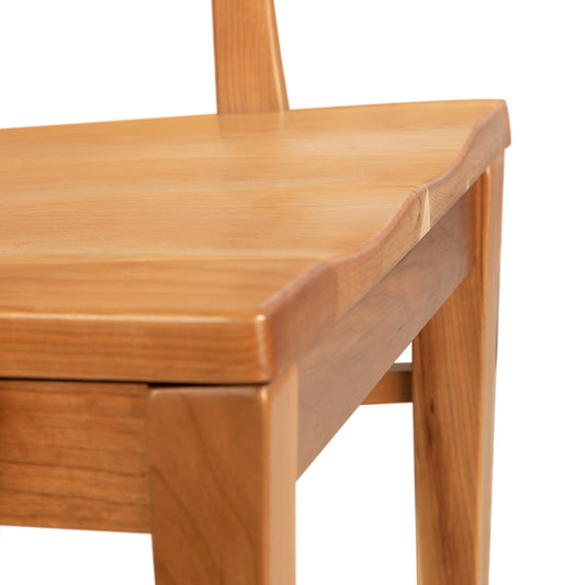 Contemporary Shaker Chair by Vermont Woods Studios, close-up highlighting the handcrafted wood seat and fine craftsmanship. Discontinued model.