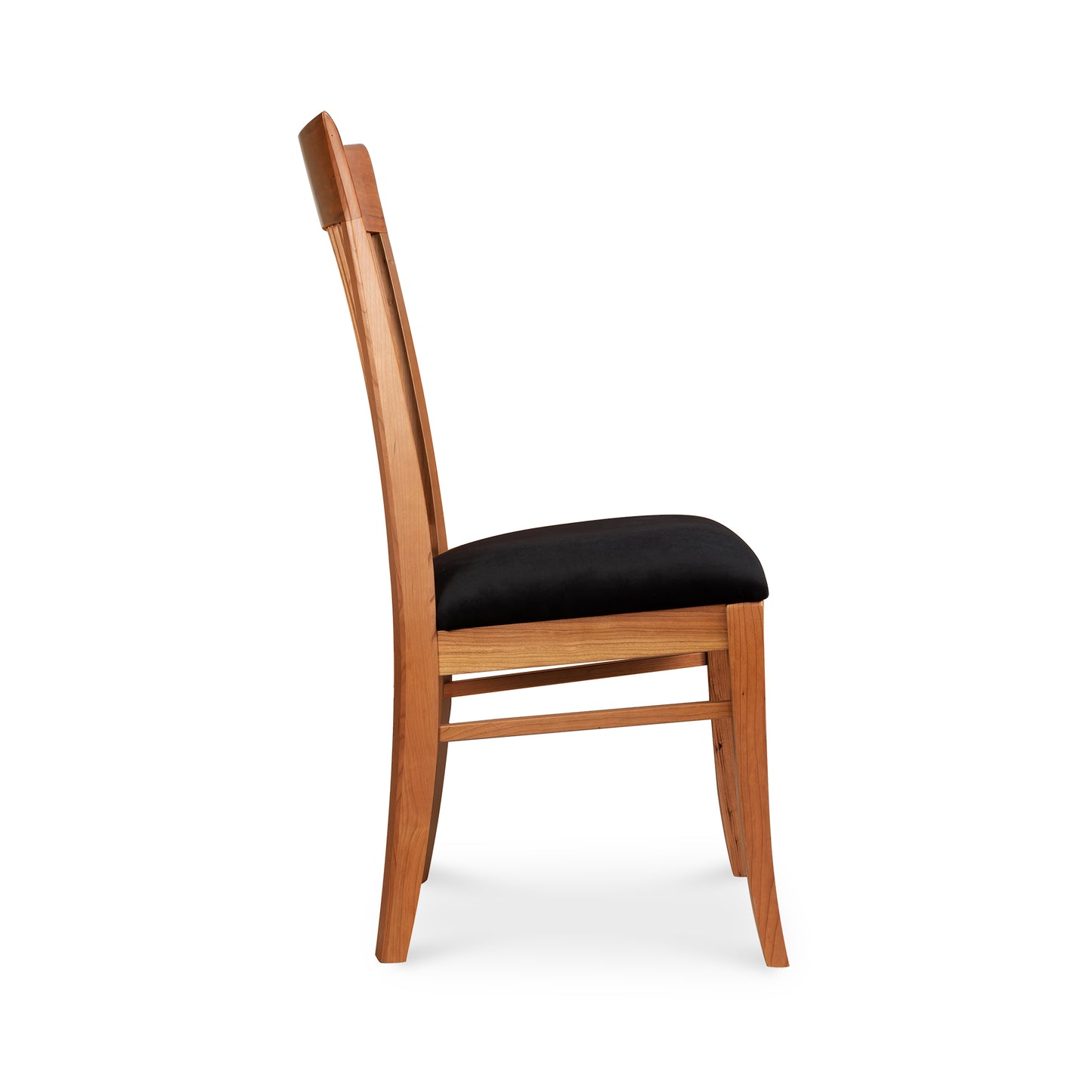 Side view of a Vermont Woods Studios Contemporary Shaker chair with a slanted back and a black cushioned seat, isolated on a white background.