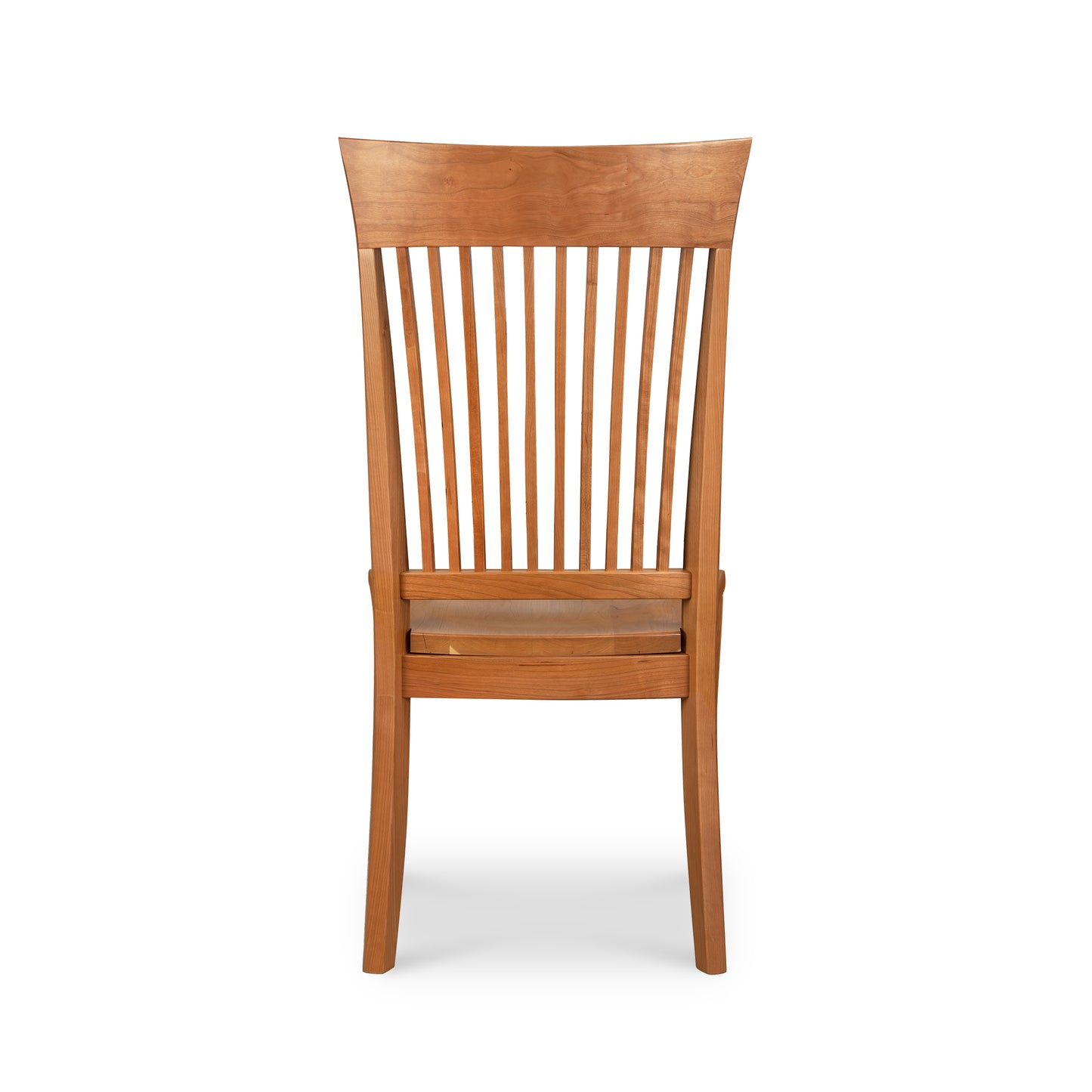 A Vermont Woods Studios Contemporary Shaker Chair with Wood Seat, featuring a high, slightly curved backrest with vertical slats and a scooped wooden seat, presented against a white background.