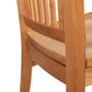 A close up of a wooden dining chair.