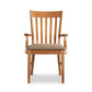 A wooden chair with a tan upholstered seat.